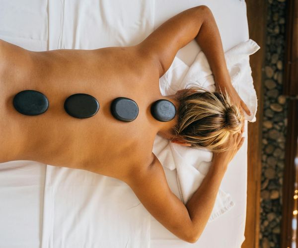 Stones balanced on top of each other, symbolizing mind and body balance.